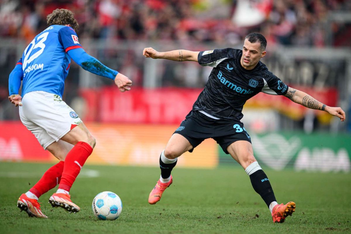Alemanha: Leverkusen volta aos triunfos em Kiel e fica à condição a cinco pontos do Bayern